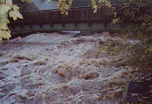  Footbridge view up river 